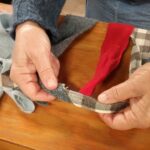 Hands working fibers